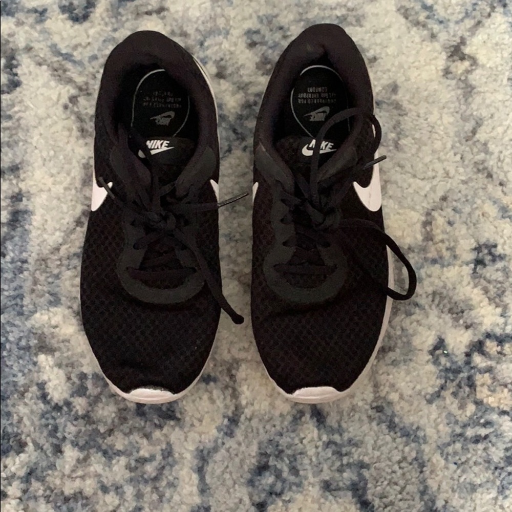 black and white NIKE shoes